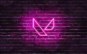 Valorant Neon Logo Glowing on Dark Brick Wall with Purple Lighting HD wallpaper