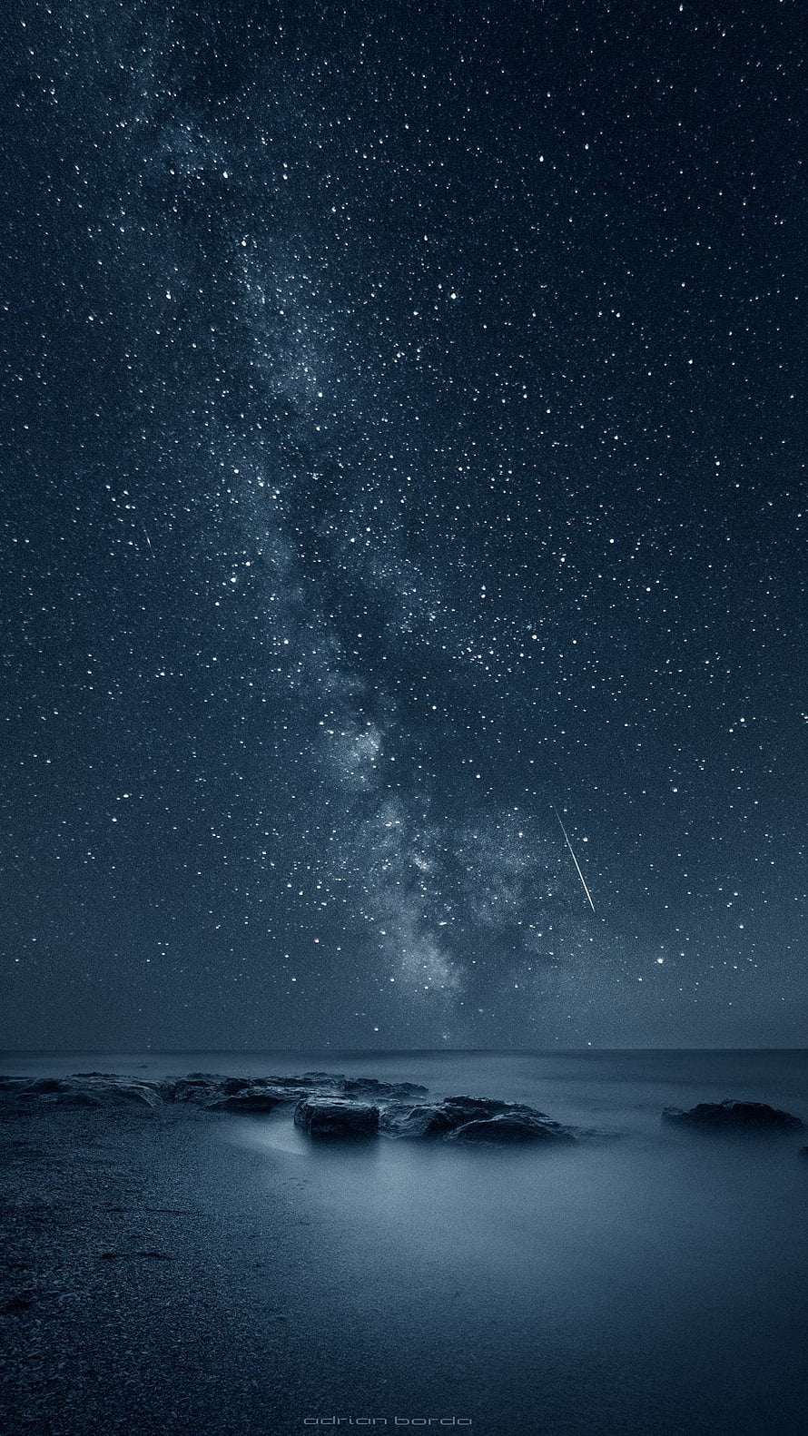 Stunning Milky Way Galaxy Over Calm Ocean With Shooting Star And Rocks HD phone wallpaper