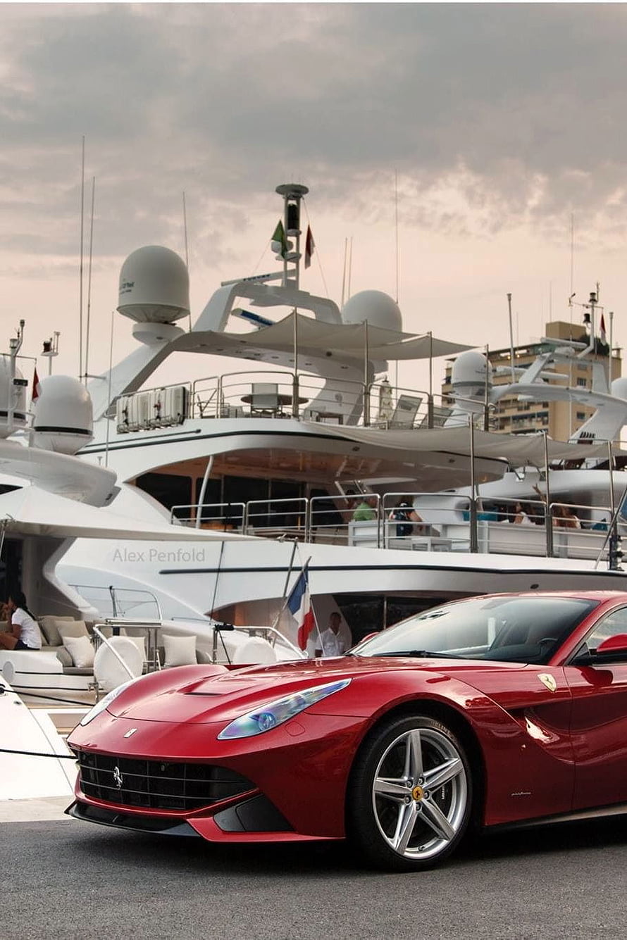 Red Ferrari 812 Superfast Parked at Marina with Luxury Yacht in Background HD phone wallpaper