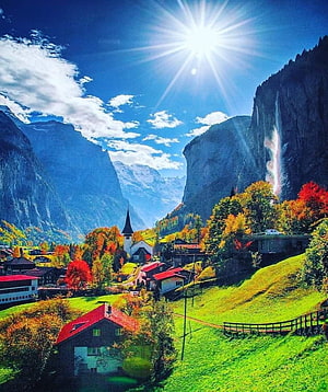 Stunning Autumn Landscape of Lauterbrunnen Valley in Switzerland with Waterfalls and Mountains HD phone wallpaper
