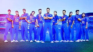 Indian Cricket Team Players in Blue Star India Uniforms on Stadium Field HD wallpaper