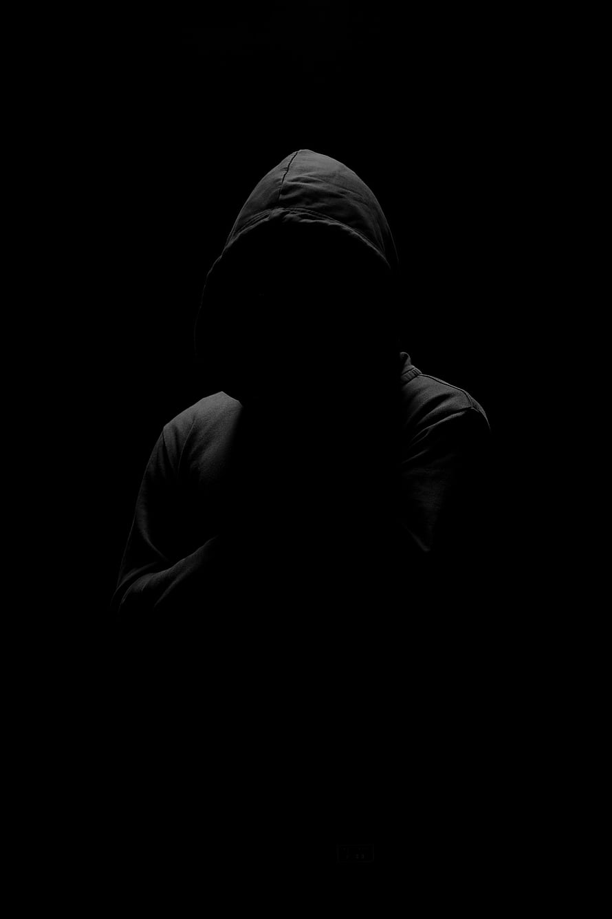 Mysterious Hooded Figure in Darkness HD phone wallpaper