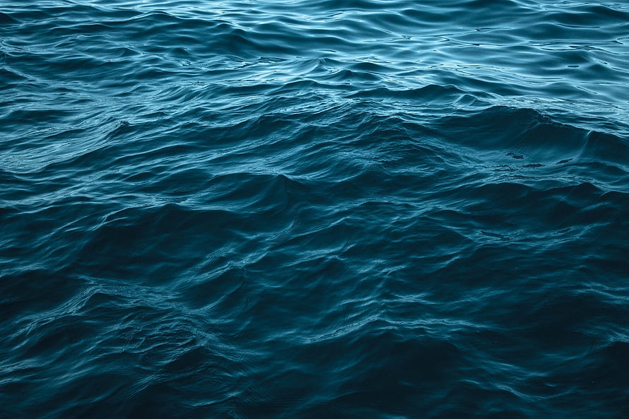 Deep Blue Ocean Surface With Gentle Rolling Waves And Ripples HD wallpaper