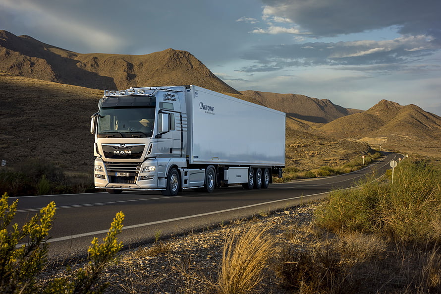 Silver MAN TGX Semi Truck with Krone Trailer Driving on Mountain Highway, MAN Trucks HD wallpaper