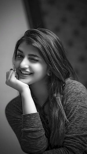Sreeleela Black and White Portrait with Soft Smile and Long Hair HD phone wallpaper