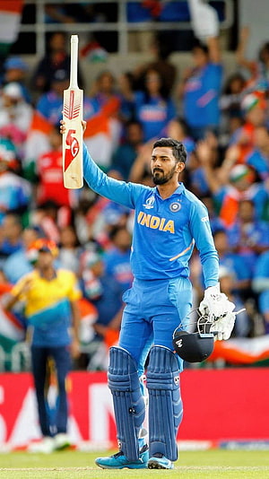 KL Rahul Celebrating a Milestone with Bat Raised in India Cricket Jersey HD phone wallpaper
