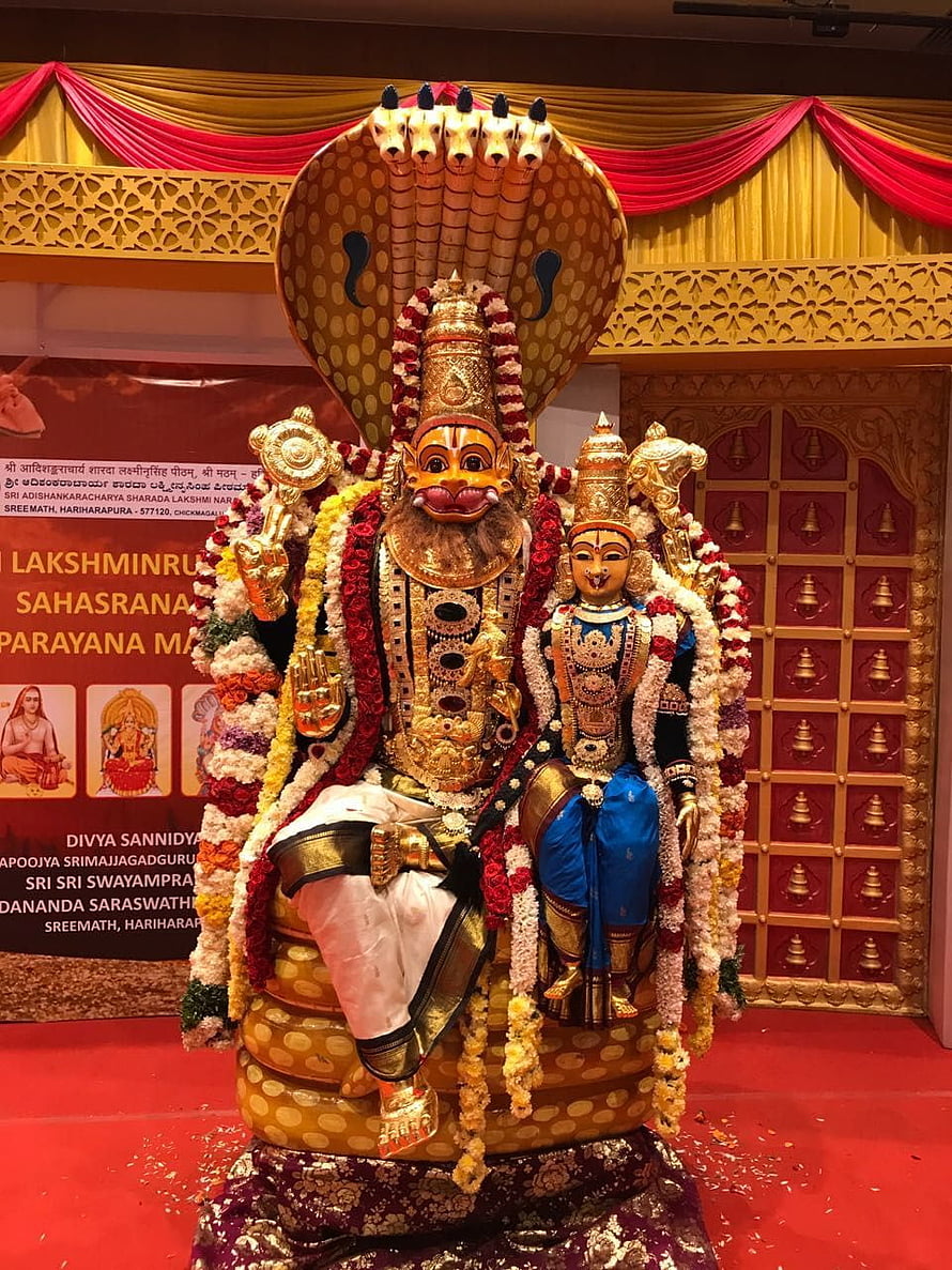 Lakshmi Narasimha Swamy Temple Idol with Serpent Hood and Floral Garlands HD phone wallpaper