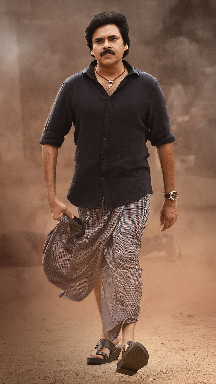 Actor Mohanlal Walking in Dusty Environment Wearing Black Shirt and Checkered Mundu HD phone wallpaper