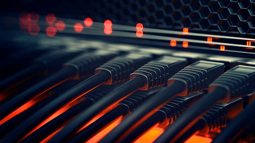 Close-up of network cables plugged into a server rack with glowing red indicator lights HD wallpaper