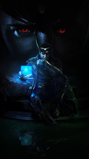 Loki Crouching with Glowing Cube and Horned Helmet in Dark Cinematic Scene HD phone wallpaper
