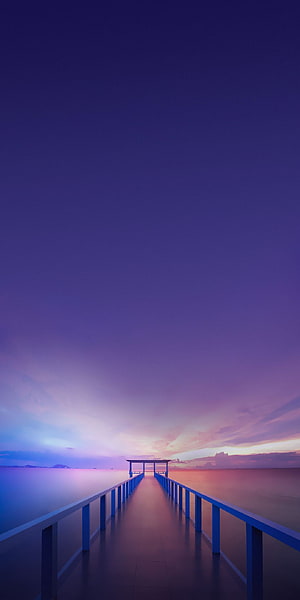 Serene Ocean Pier at Twilight with Purple Sky Gradient and Distant Horizon HD phone wallpaper