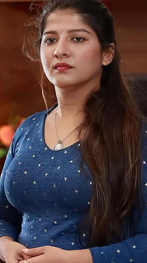 Ashwathy Nair in a Blue Star-Printed Top with Long Dark Hair HD phone wallpaper