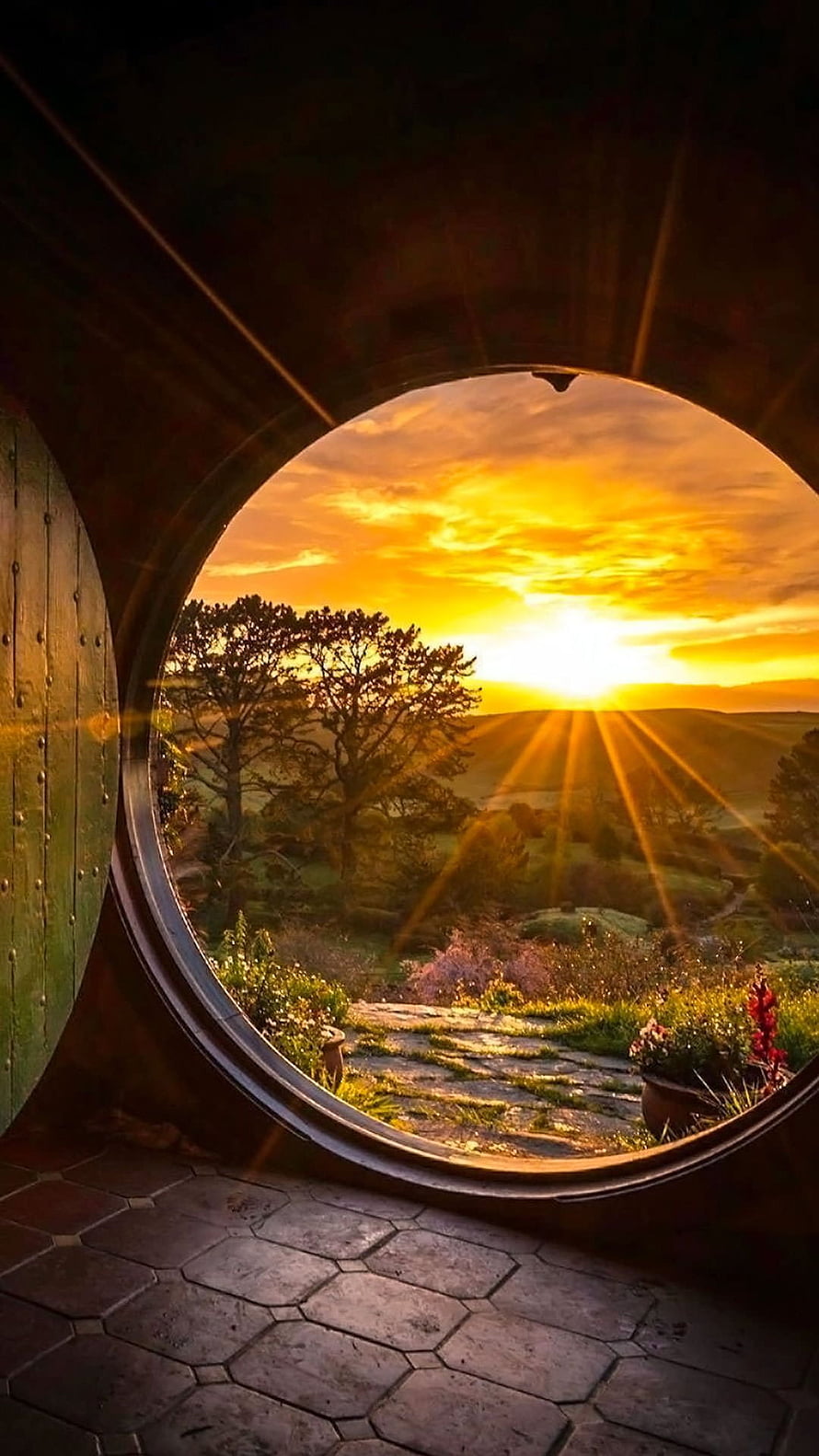 Sunset View Through Round Window at Hobbiton in The Shire from Lord of the Rings HD phone wallpaper