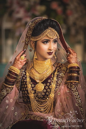 Elegant Indian Bride in Maroon Lehenga with Heavy Gold Jewelry and Henna HD phone wallpaper
