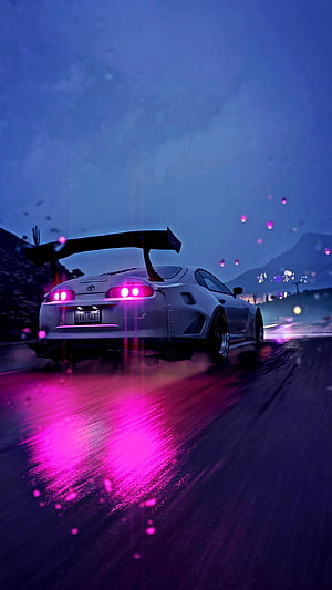 White Toyota Supra with Neon Pink Taillights Drifting on Wet Road at Night HD phone wallpaper