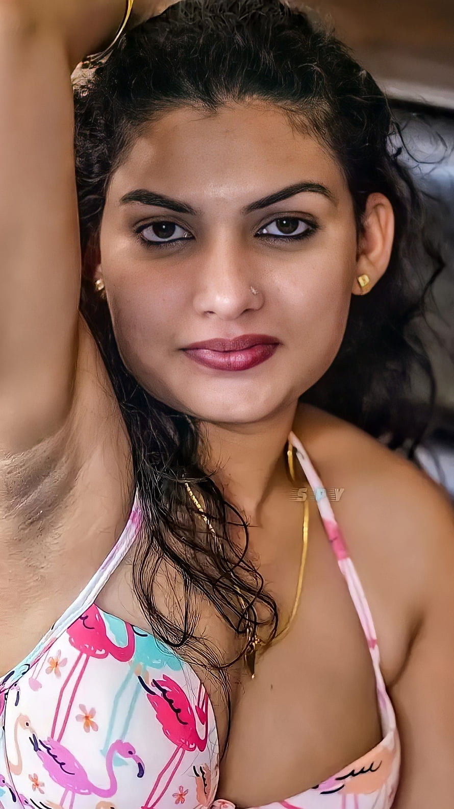 Portrait of a woman in a flamingo print bikini top with wet hair and gold jewelry, Reshmi nair, malayalam movie HD phone wallpaper