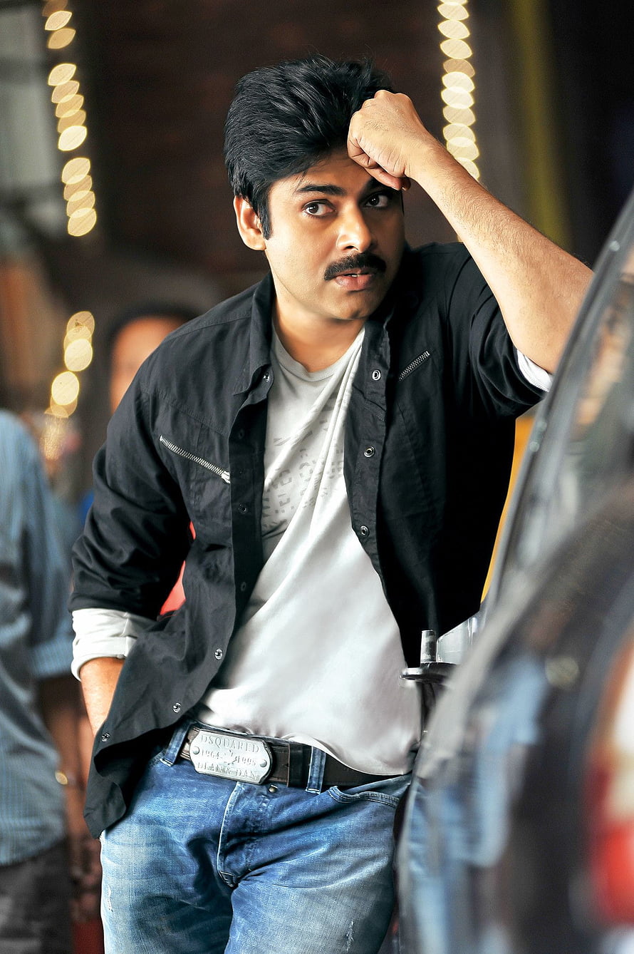 Pawan Kalyan in Black Jacket and Jeans with Festive Bokeh Lights HD phone wallpaper