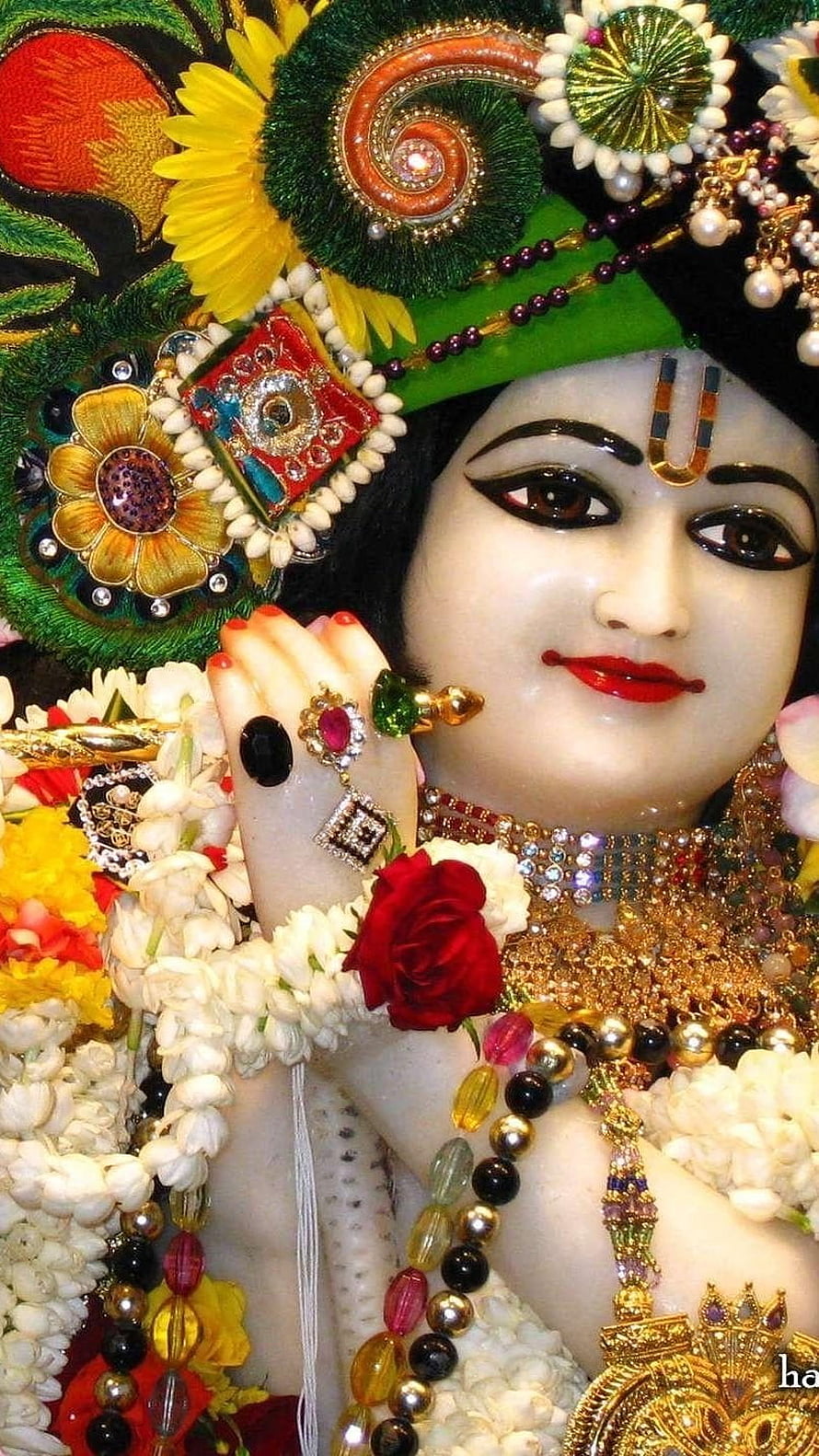 Khatu Shyam Deity Portrait with Ornate Jewelry and Floral Garlands HD phone wallpaper