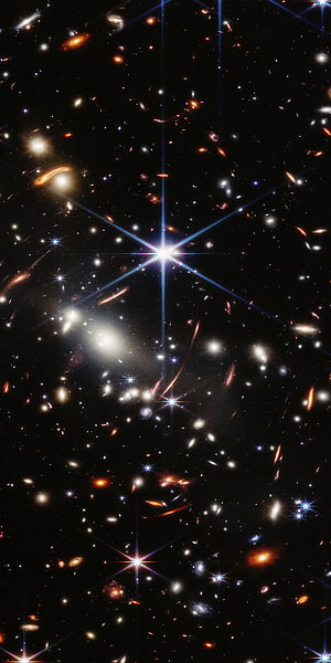 James Webb Space Telescope Deep Field Image Featuring Distant Galaxies and Bright Stars in the Universe HD phone wallpaper
