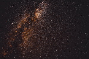 Milky Way Galaxy Core with Dense Star Fields and Cosmic Dust Lanes Against Deep Space HD wallpaper