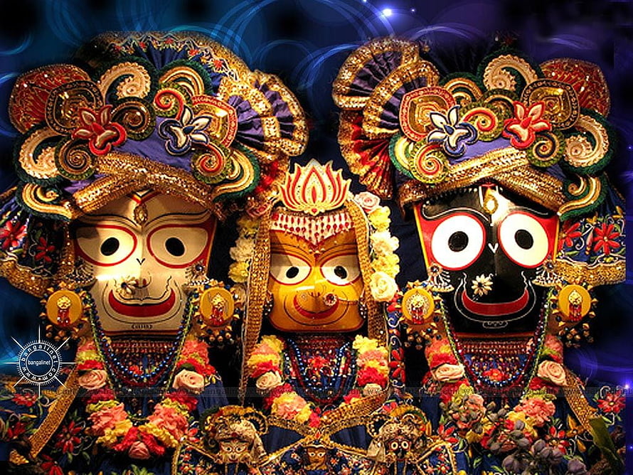 Traditional Indian Pattachitra Masks With Intricate Painted Details And Floral Garlands HD wallpaper
