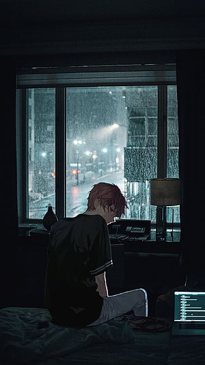 Melancholic Anime Boy Gazing at Rainy City Night Through Bedroom Window HD phone wallpaper