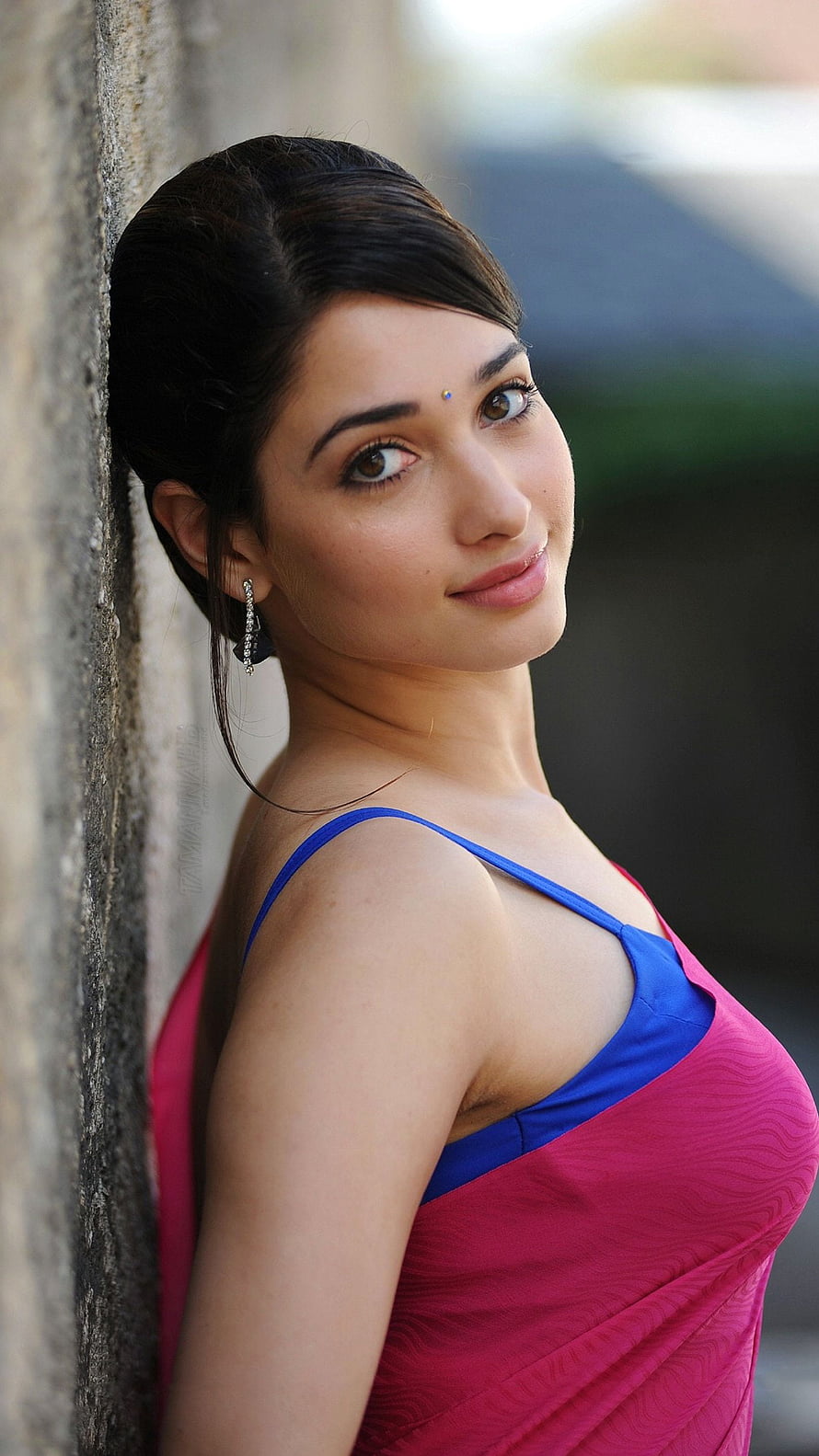 Tamannaah Bhatia in a Pink and Blue Dress Leaning Against a Wall, Tamanna Bhatia, telugu actress, saree beauty HD phone wallpaper