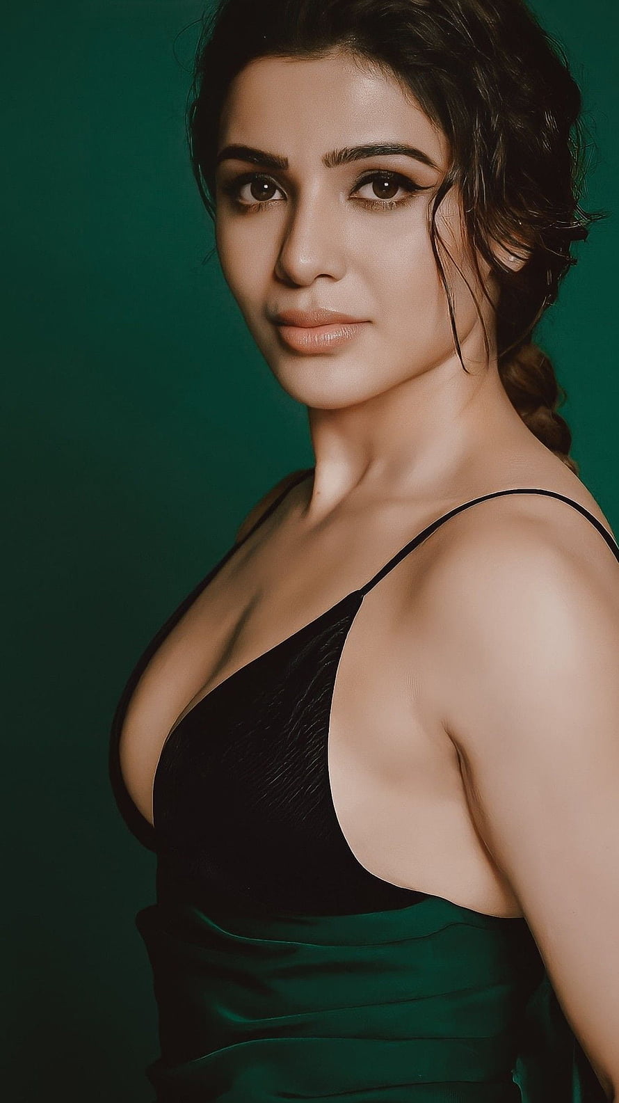 Sakshi Tanwar in a stunning black and green dress portrait with elegant makeup and braided hairstyle HD phone wallpaper