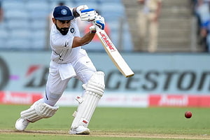 Virat Kohli Playing Cover Drive in Indian Test Cricket Whites HD wallpaper