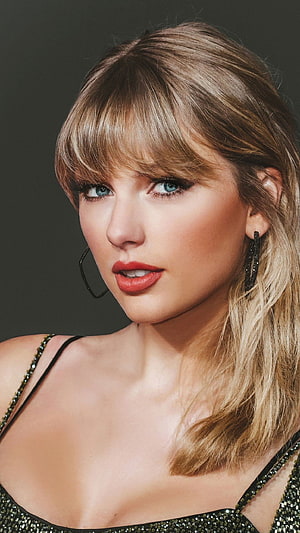 Taylor Swift Close-Up Portrait in Sequined Dress with Bangs and Statement Earrings HD phone wallpaper