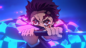 Tanjiro Kamado in Intense Battle Stance with Glowing Blue Aura from Demon Slayer HD wallpaper