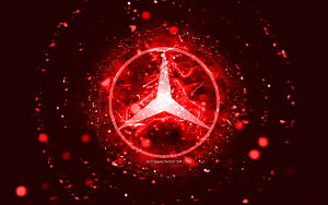 Glowing Mercedes-Benz Star Emblem Set Against a Fiery Red Abstract Background HD wallpaper