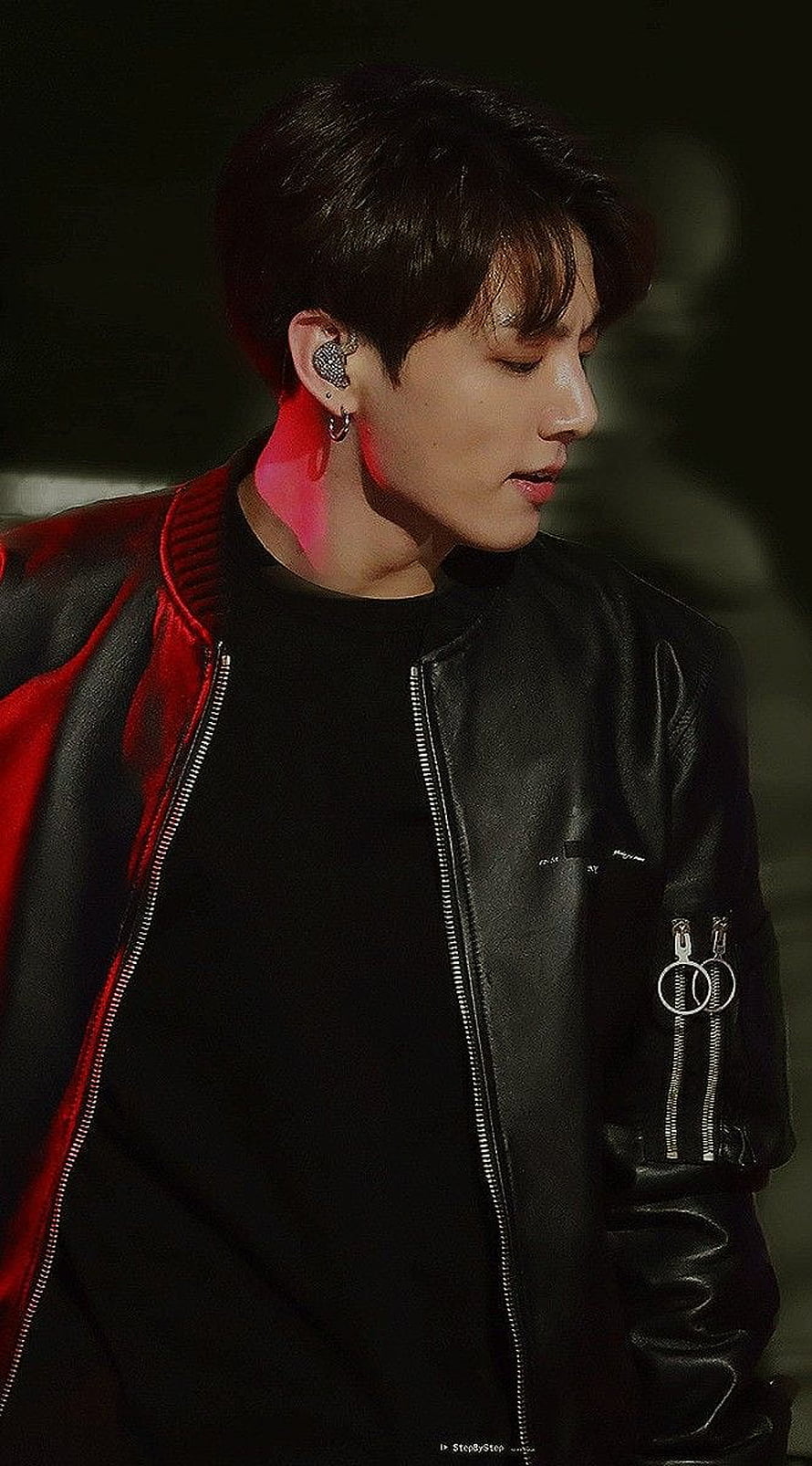Stunning Portrait of K-Pop Idol in Black Leather Jacket with Red Accents HD phone wallpaper