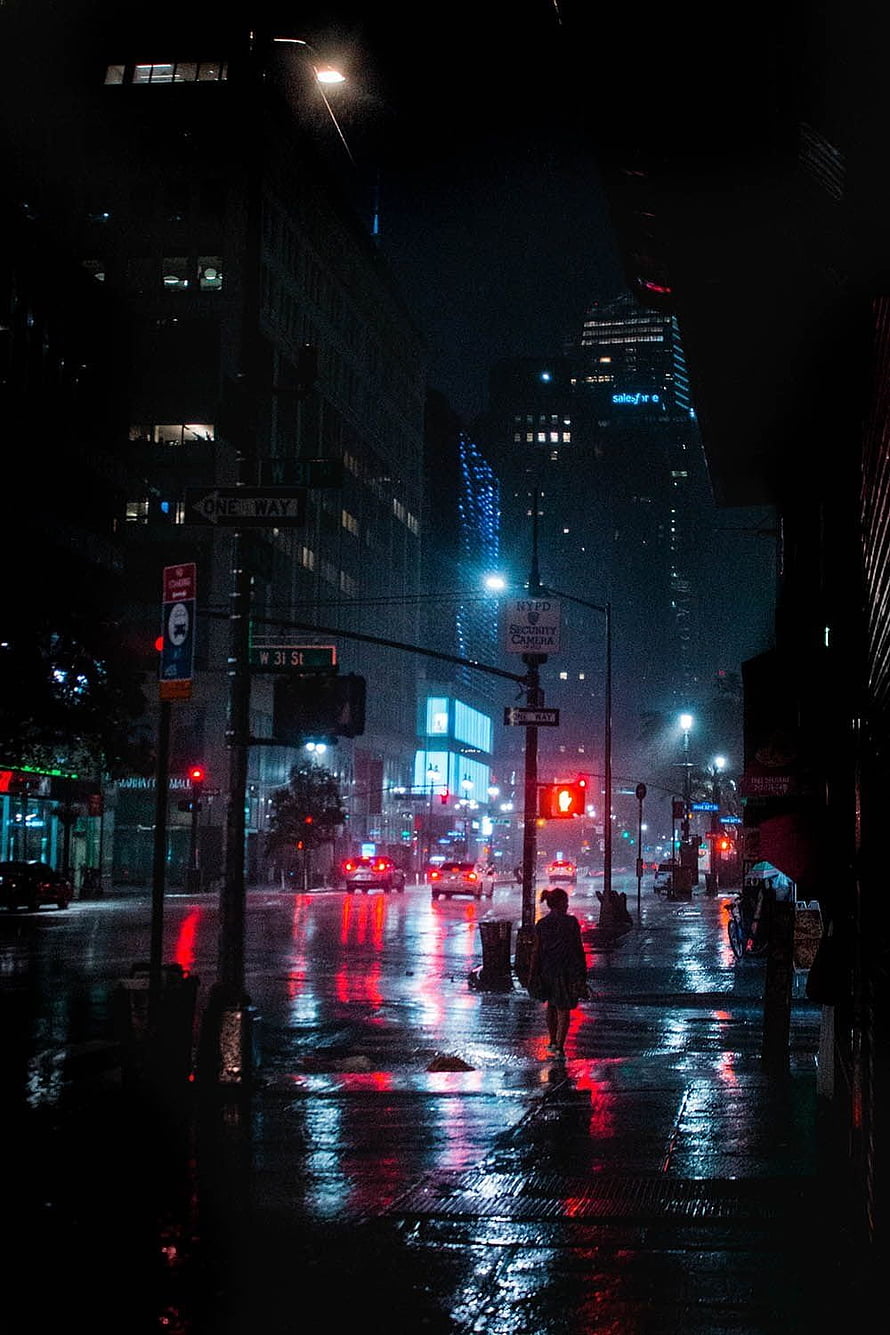 Cinematic Night Rain in New York City with Neon Reflections on Wet Streets HD phone wallpaper