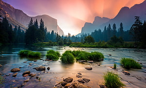 Serene Mountain River Valley at Sunset with Misty Peaks and Flowing Water HD wallpaper