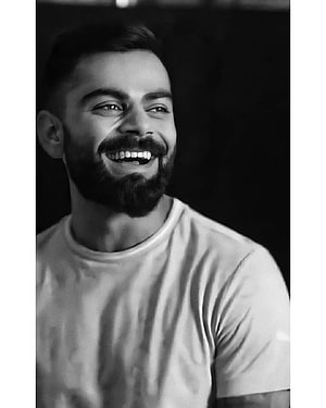 Virat Kohli Black and White Portrait with Bearded Smile and Casual T-Shirt HD phone wallpaper