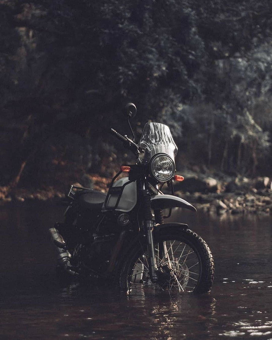 Royal Enfield Himalayan Adventure Motorcycle Parked in Shallow Stream HD phone wallpaper