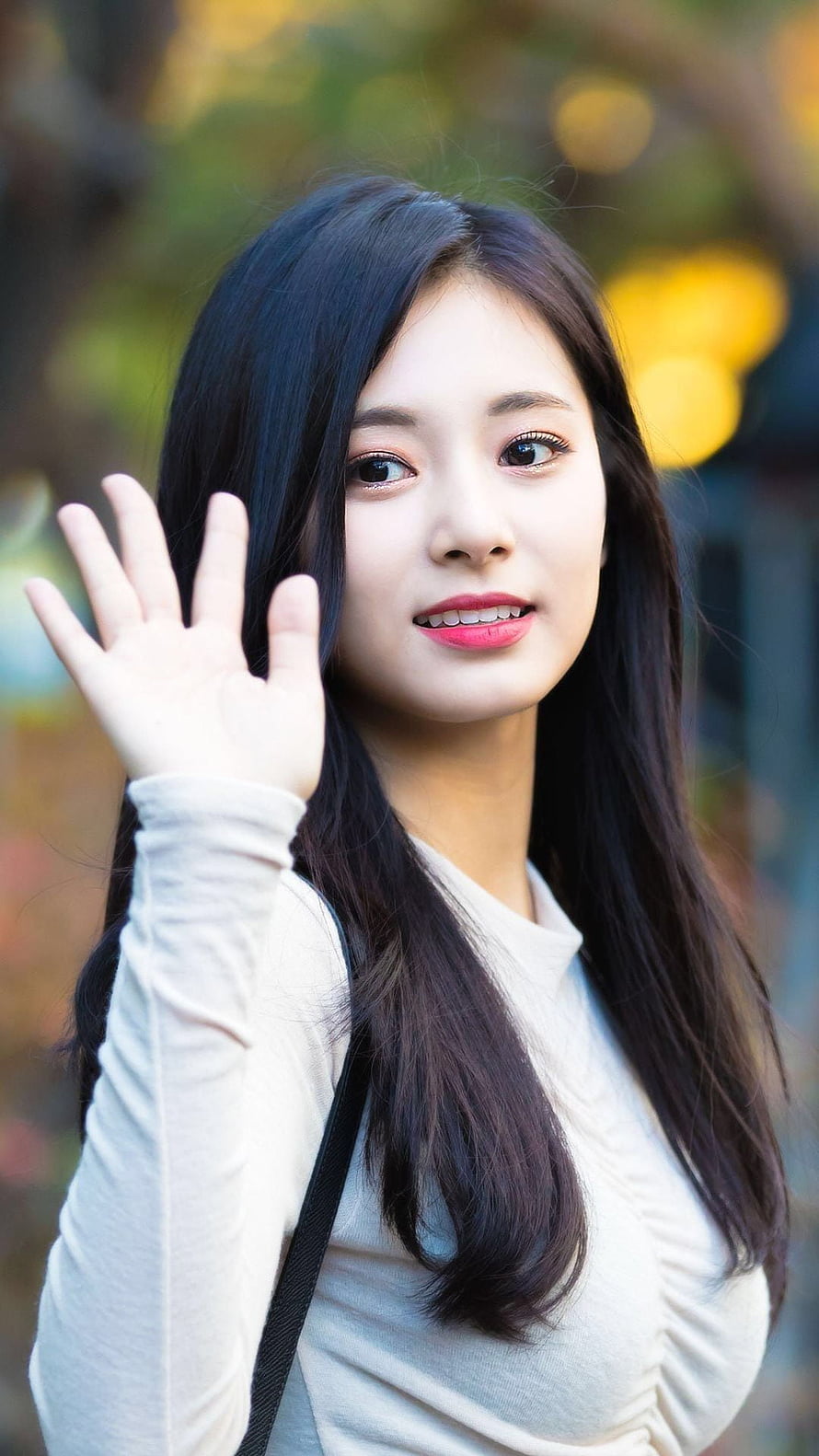 Tzuyu from Twice Waving Hello in White Top Portrait HD phone wallpaper