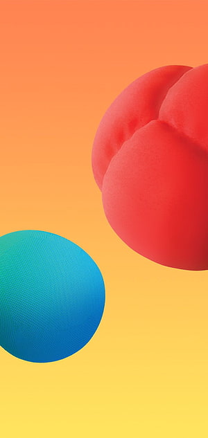 Abstract 3D spheres in red and blue on a warm orange to yellow gradient background HD phone wallpaper