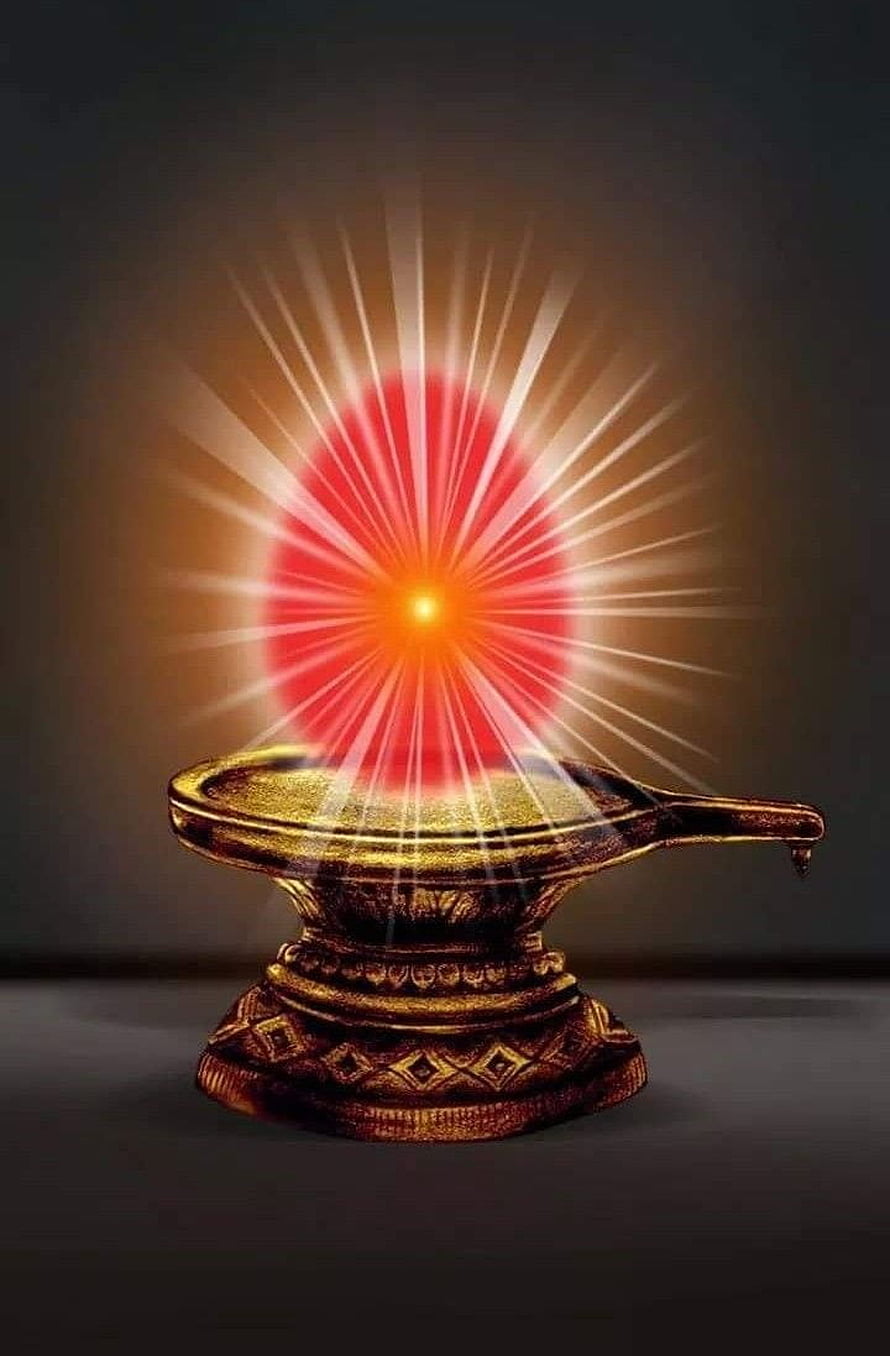 Glowing Diya Oil Lamp with Radiant Red Aura and Divine Light Rays on Dark Background HD phone wallpaper