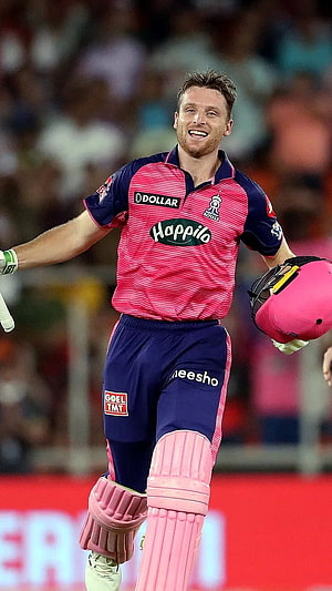 Jos Buttler in Rajasthan Royals pink kit celebrating during an IPL cricket match HD phone wallpaper