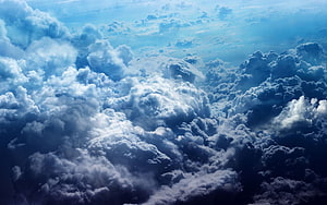 Aerial View of Dramatic Cumulus Clouds in Deep Blue Sky HD wallpaper