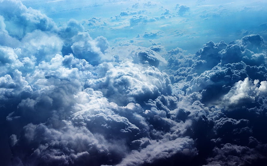 Aerial View of Dramatic Cumulus Clouds in Deep Blue Sky HD wallpaper