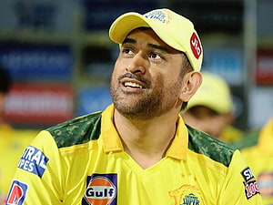 MS Dhoni in Chennai Super Kings yellow jersey and cap during IPL match HD wallpaper