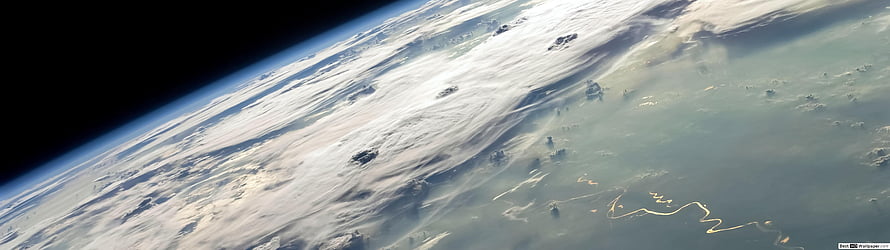 Earth Horizon From Space With Swirling Clouds And Ocean Surface HD wallpaper