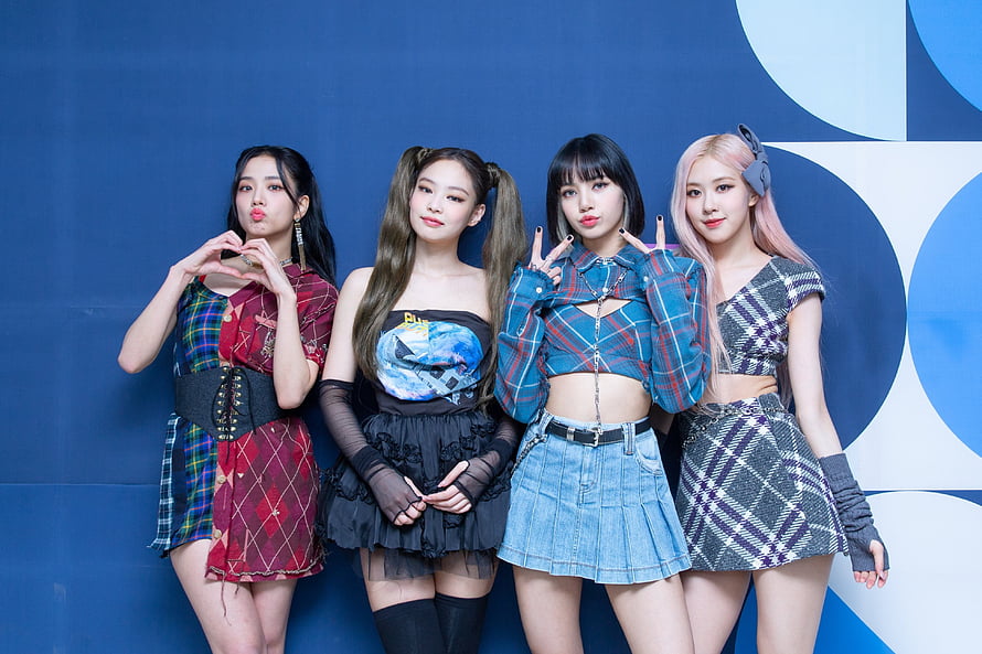 NewJeans K-pop Girl Group Posing in Plaid and Denim Outfits Against Blue Background HD wallpaper