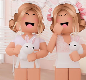 Cute Roblox Avatars Holding White Bunnies in Pink Easter Outfits HD wallpaper