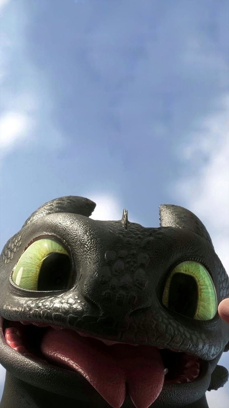 Toothless Dragon Close-Up With Green Eyes And Tongue Out Against Blue Sky HD phone wallpaper