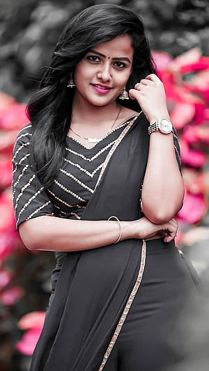 Woman in Black Saree with Gold Embroidery and Pink Floral Background, Vaishnavi Chaitanya, telugu actress HD phone wallpaper