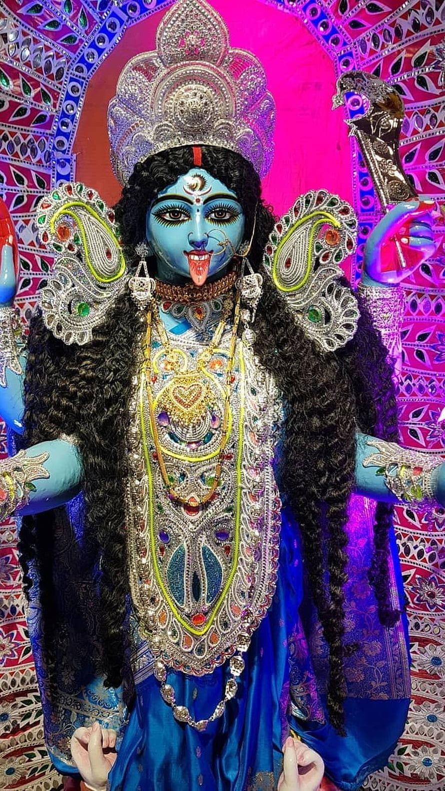 Maa Kali Durga Murti with Elaborate Jewelry and Ornate Temple Backdrop HD phone wallpaper